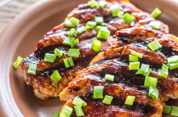 Sticker - Grilled pork steaks on the plate