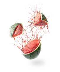 Wall Mural - Sliced Watermelon and splash isolated on white