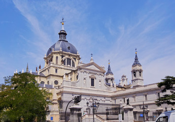 Wall Mural - Spain, Madrid, View of the Cathedral of Saint Mary the Royal of La Almudena and Plaza de la Armeria..