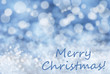 © Nelos - Blue Bokeh Background, Snow, Text Merry Christmas
