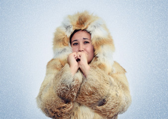asian woman in fox fur coat warming hands, cold, snow, blizzard