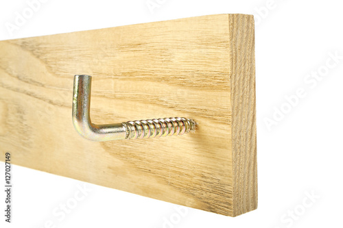 Fotografie, Obraz Screw hook screwed into the wooden plank, white background
