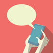 © jozefmicic - Smartphone conversation or communication banner with hands holding mobile phone and speech bubble.