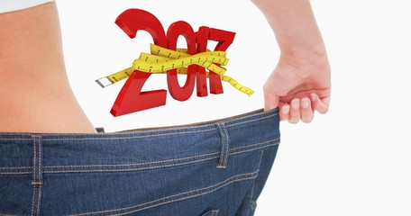Poster - Composite image of close up of a woman waist in a too big pants