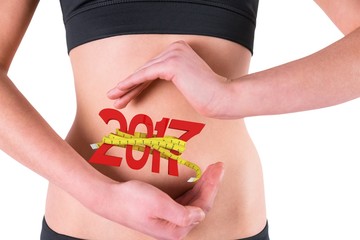 Poster - Composite image of woman with hands over belly