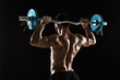 © nazarovsergey - bodybuilder lifting a barbell on black background