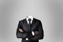 Businessman Without Head Crossed Arms Grey Background
