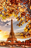 Fototapeta Boho - Eiffel Tower with autumn leaves in Paris, France