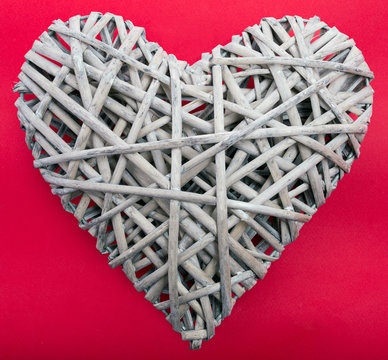 (withe, withy, osier, sallow, vine) braided on a frame in the form of hearts isolated on a white background - pictures concept theme Love and St. Valentine's Day