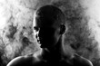 A man in abstract smoke on the black background