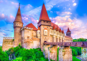 Wall Mural - Beautiful Hunyad Corvin medieval castle in the sunset light, Hunedoara town,Transylvania landamark, Romania,Europe