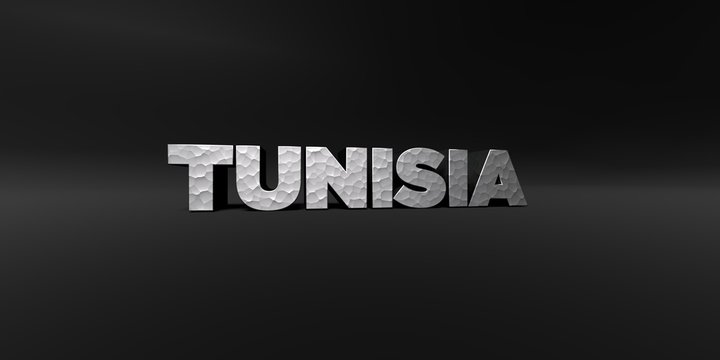 TUNISIA - hammered metal finish text on black studio - 3D rendered royalty free stock photo. This image can be used for an online website banner ad or a print postcard.