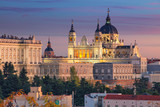 Fototapeta  - Madrid. Image of Madrid skyline with Santa Maria la Real de La Almudena Cathedral and the Royal Palace during sunset.