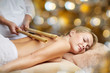 © Syda Productions - close up of woman lying and having massage in spa