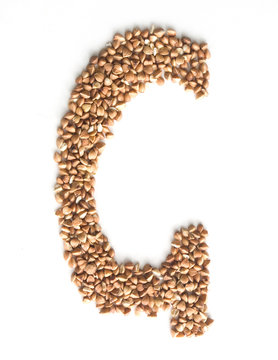 Letter G made of buckwheat   isolated on white background