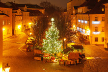 Christmas Tree And Holiday Decorations In The Old Town In The Magical City Of Prague At Night, Czech Republic