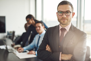 Canvas Print - Handsome bearded professional with folded arms