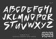 Alphabet vector set of white capital handwritten letters on black background. Handwritten italic font with brush strokes in horror style.