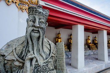 Stone Thai-Chinese style sculpture and thai art architecture in Wat Phra Chetupon Vimolmangklararm (Wat Pho) temple, Thailand. Photo taken on: 2 November , 2016