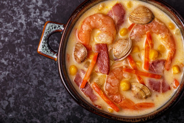 Homemade clam chowder with shrimps.