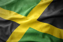 Waving Colorful Flag Of Jamaica.