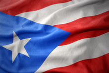 Waving Colorful Flag Of Puerto Rico.