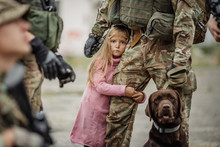 Soldier And Children On Battlefield Background.