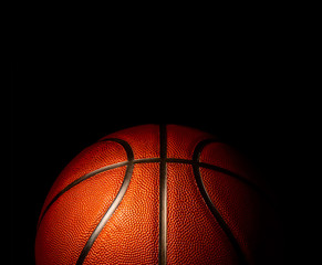 Wall Mural - basketball on black background.