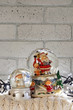 Christmas snow globe with santa claus inside and garland lights