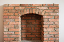 Indoor DIY Project: Building Fireplace In The House: Laying Bricks; Finishing. Selective Focus