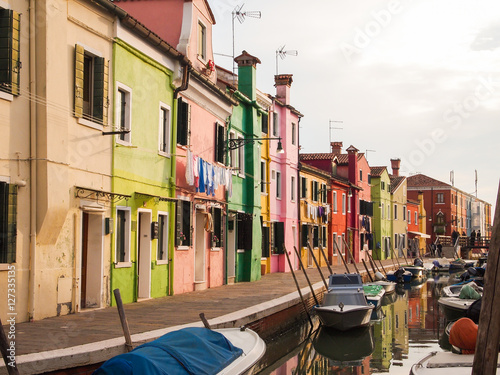 colorful street of burano island in venice, italy Poster