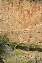 Rock Cliff And Footbridge
