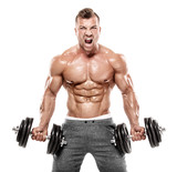 Muscular bodybuilder guy doing exercises with dumbbell