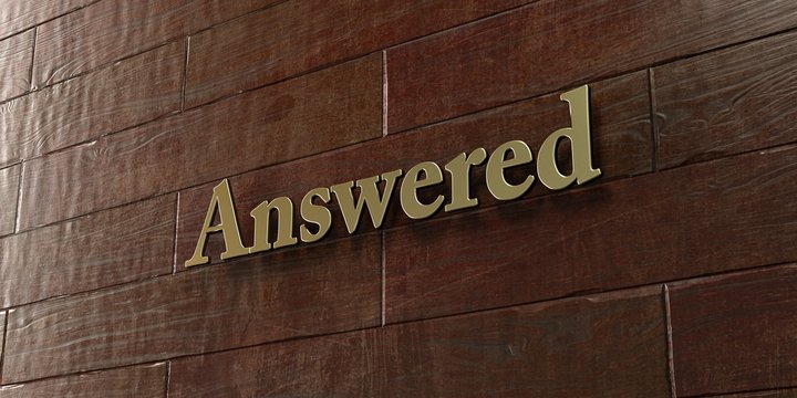 Answered - Bronze plaque mounted on maple wood wall  - 3D rendered royalty free stock picture. This image can be used for an online website banner ad or a print postcard.