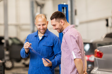 Poster - auto mechanic with clipboard and man at car shop