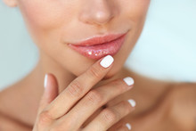 Lips Protection. Closeup Of Healthy Woman Lips And Smooth Skin