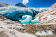 Water flows under the Aletsch glacier, which melts