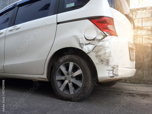 Fotografie, Obraz Details of a white car in an accident, Car crash, insurance, soft focus, light effect