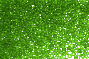  Green glass beads background - closeup beads texture