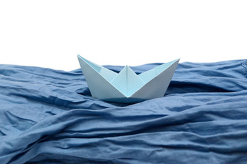 Blue paper boat, origami boats on white