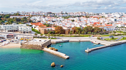 Wall Mural - Aerial from the city Lagos with the Forte da Bandeira in Portuga