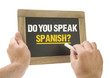 Do you speak spanish? Hand writing on board