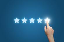Businesswoman Pointing Five Star To Increase