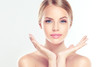 Leinwandbild Motiv Beautiful Young Woman with clean fresh skin  . Facial  treatment   . Cosmetology , beauty  and spa .
