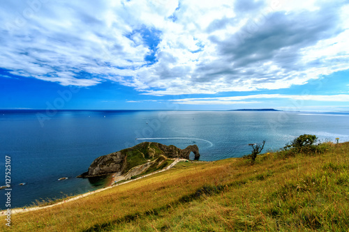 Durdle Door at the beach on the Jurassic Coast of Dorset, UK Poster