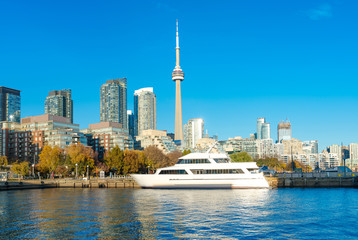 Wall Mural - Toronto's skyline with CN Tower over lake. Urban architecture -