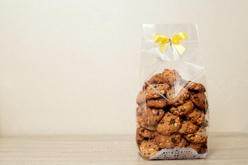 Wall Mural - Cookie in plastic bag with ribbon bow tie,Cookie packaging.