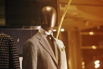 Suit in a showcase of a luxury store