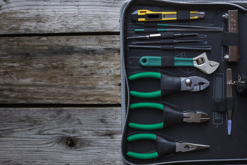 Wall Mural - tool case on a wooden table background