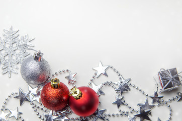 Wall Mural - red and silver xmas decoration in snow with copy space. christmas background.